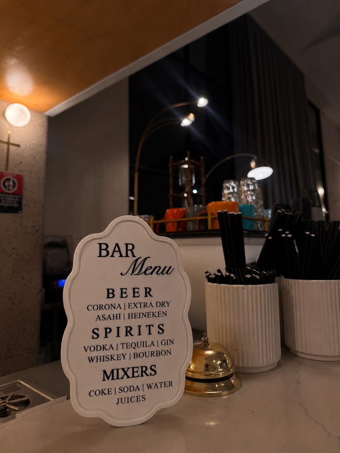 Scalloped white bar menu with raised lettering