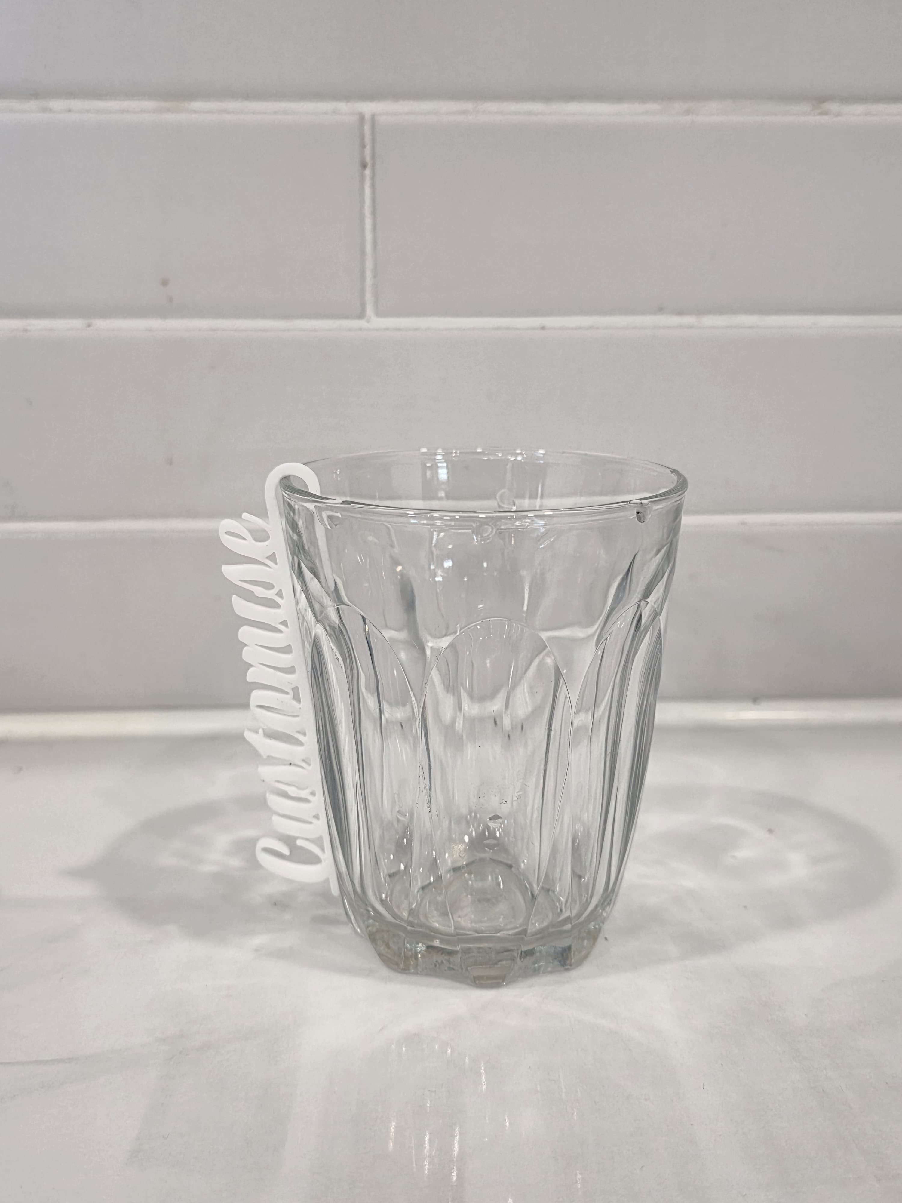 Personalised glass name tags — example of our work